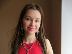 Ariana - female with brown hair and  small tits webcam at ImLive