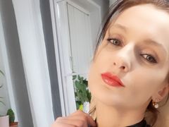 Irinka - female with red hair and  small tits webcam at LiveJasmin