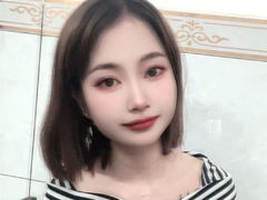 JeanneJie - female with brown hair and  big tits webcam at LiveJasmin