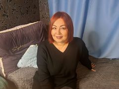 KiraBils - female with brown hair and  big tits webcam at LiveJasmin
