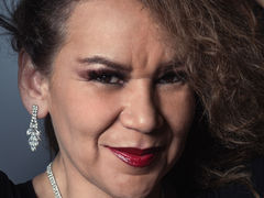 MelaniaKnauss - female with brown hair and  big tits webcam at LiveJasmin