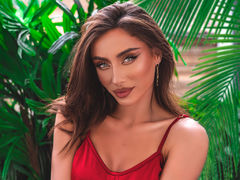 Minnie - female with black hair and  small tits webcam at LiveJasmin