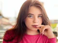 ReginaBoness - female with brown hair and  big tits webcam at LiveJasmin