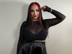 RiaLovsey - female with black hair and  big tits webcam at LiveJasmin