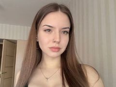 SenaidaRowson - female with brown hair and  big tits webcam at LiveJasmin