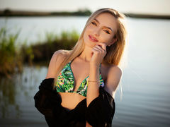 sherinestone - blond female with  small tits webcam at ImLive