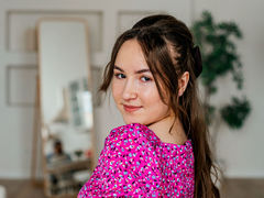 SindieStorm - female with brown hair and  big tits webcam at LiveJasmin