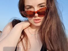SofiaYour - female with brown hair and  big tits webcam at LiveJasmin
