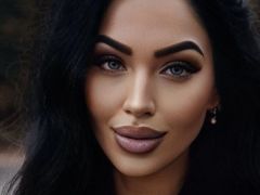 StellaNellson - female with black hair and  big tits webcam at LiveJasmin