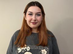 TrishaHott - female with red hair and  big tits webcam at LiveJasmin