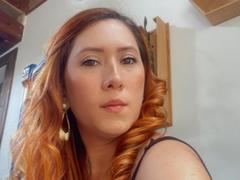 AfroditaMartinez - female with brown hair and  big tits webcam at LiveJasmin