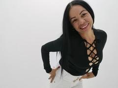 Ahmbar - female with black hair and  big tits webcam at xLoveCam