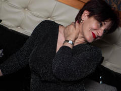 FlirtyMature - female with brown hair and  big tits webcam at LiveJasmin