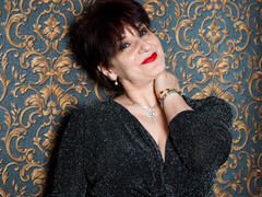 FlirtyMature - female with brown hair and  big tits webcam at LiveJasmin