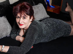 FlirtyMature - female with brown hair and  big tits webcam at LiveJasmin