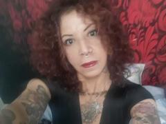 Axxy_Anny - female with red hair webcam at ImLive