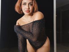 BlueFia - female with red hair and  big tits webcam at xLoveCam