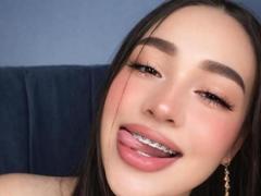 CandyVela - female with brown hair and  big tits webcam at xLoveCam