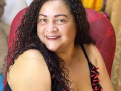 CarolinaMill - female with brown hair and  big tits webcam at xLoveCam