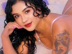 MelanieRossie - female with black hair and  big tits webcam at LiveJasmin
