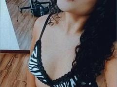 MelanieRossie - female with black hair and  big tits webcam at LiveJasmin