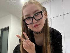 CrystaLux - blond female with  big tits webcam at xLoveCam