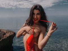 Curliest_Sue - female with black hair and  small tits webcam at ImLive