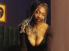 DaniaMarcell - female with brown hair and  big tits webcam at StripChat