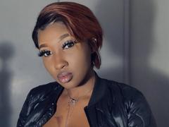 DarkCocoa - female with red hair and  big tits webcam at xLoveCam