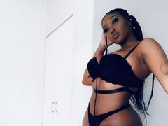 DarkCocoa - female with red hair and  big tits webcam at xLoveCam