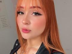 DarkCourtney - female with red hair and  big tits webcam at xLoveCam