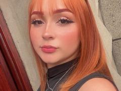 DarkCourtney - female with red hair and  big tits webcam at xLoveCam