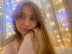 NidiaHeagy - female with brown hair and  big tits webcam at LiveJasmin