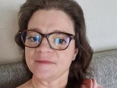 BusenwunderDolly - female with brown hair and  big tits webcam at LiveJasmin