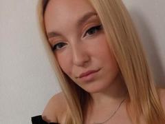 DinaToni - blond female with  small tits webcam at xLoveCam