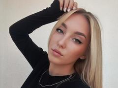 DinaToni - blond female with  small tits webcam at xLoveCam