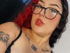 DomickArias - female with red hair and  small tits webcam at xLoveCam