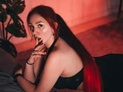DoraJay - female with red hair and  big tits webcam at LiveJasmin