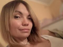 EllaPearlie - female with red hair and  small tits webcam at xLoveCam