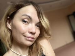 EllaPearlie - female with red hair and  small tits webcam at xLoveCam