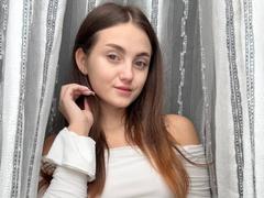 ElsyNevares - female with brown hair and  big tits webcam at xLoveCam