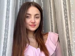 ElsyNevares - female with brown hair and  big tits webcam at xLoveCam