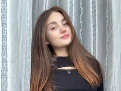 ElsyNevares - female with brown hair and  big tits webcam at xLoveCam