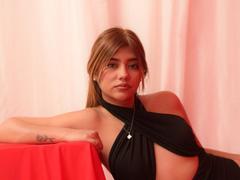 ElySainz - female with red hair and  big tits webcam at xLoveCam