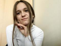 EmilySparkle - female with brown hair and  small tits webcam at xLoveCam