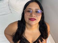 EvaJohns - female with black hair and  big tits webcam at xLoveCam
