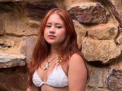 EvaLux - female with red hair webcam at ImLive