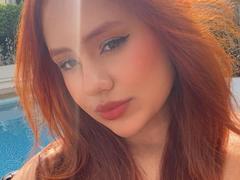 EvaLux - female with red hair webcam at ImLive