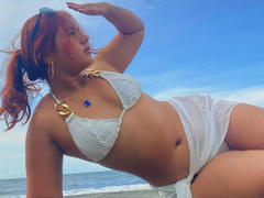 EvaLux - female with red hair webcam at ImLive