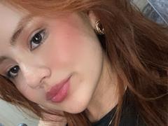 EvaLux - female with red hair webcam at ImLive